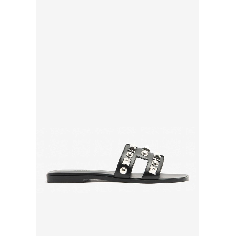 Oran H Cut-Out Sandals in Black Calfskin and Medor Studs